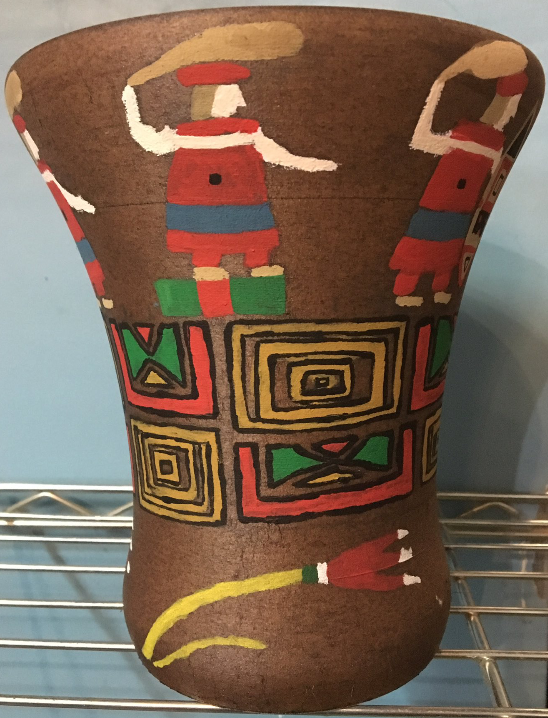 Brown 3D kero cup with paintings of figures and patterns 